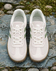 Dannto Frond - Non-Slip Zero Drop Barefoot Sneakers green pair shown from above on rocks