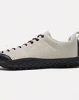 Dannto beige barefoot trail shoes shown from the side