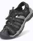 Dannto women's trailport H2 sandal black gray shown from a three quarter view