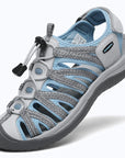Dannto women's closed toe hiking sandals S2 white blue shown from a three quarter view