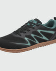 Gliss II - black wide toe box barefoot shoes for women shown from a three quarter view