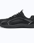 Dannto Aero N1 - 3E Wide Mesh Barefoot Shoes black shown being put on while sitting outdoors