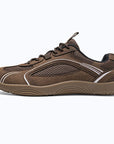 Dannto Aero N1 - 3E Wide Mesh Barefoot Shoes brown shown being put on while sitting outdoors