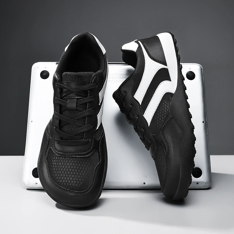 Dannto Mesh Wide - Toe Barefoot Shoes black pair shown from front and side views