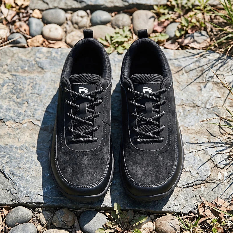 Dannto Aero N4 - 3E Wide Barefoot Shoes black pair shown from above on rocks