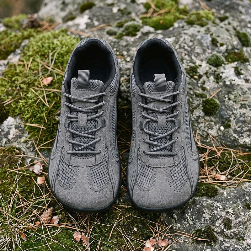 Dannto Aero N1 - 3E Wide Mesh Barefoot Shoes dark gray pair shown from above on moss and rocks