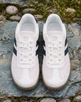 Dannto Frond - Non-Slip Zero Drop Barefoot Sneakers white pair shown from above on rocks
