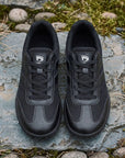 Dannto Frond - Non-Slip Zero Drop Barefoot Sneakers black pair shown from above on rocks