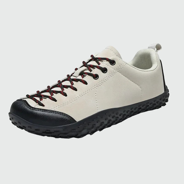 Dannto beige Veld II Pro - Scarpe leggere a piedi nudi da uomo e da donna mostrate da una vista di tre quarti