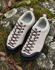 Dannto Veld I Pro - 3E Wide Barefoot Shoes beige pair shown from above on moss-covered rocks