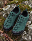 Dannto Veld I Pro - 3E Wide Barefoot Shoes green pair shown from above on moss-covered rocks