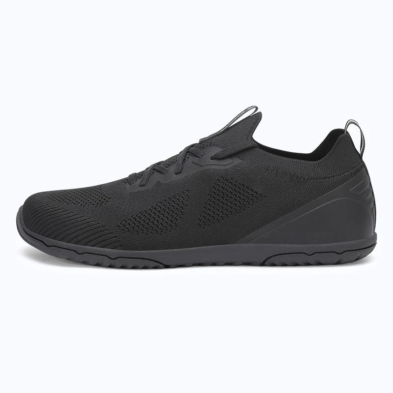 Dannto black zero drop barefoot sneakers shown from the side
