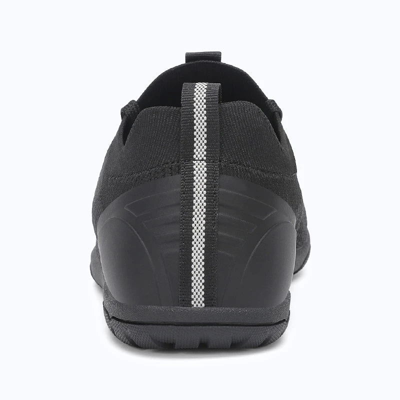 Dannto black zero drop barefoot sneakers shown from the back