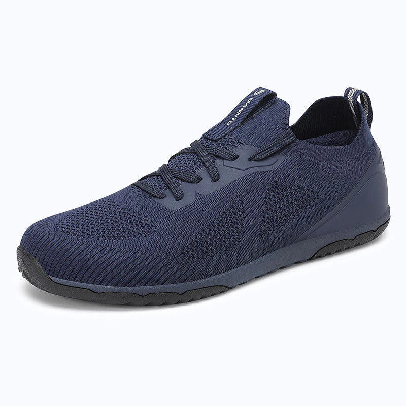 Dannto blue zero drop barefoot sneakers shown from a three quarter view