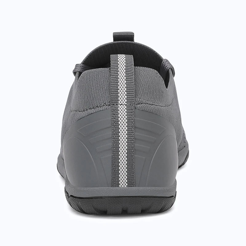 Dannto dark gray zero drop barefoot sneakers shown from the back