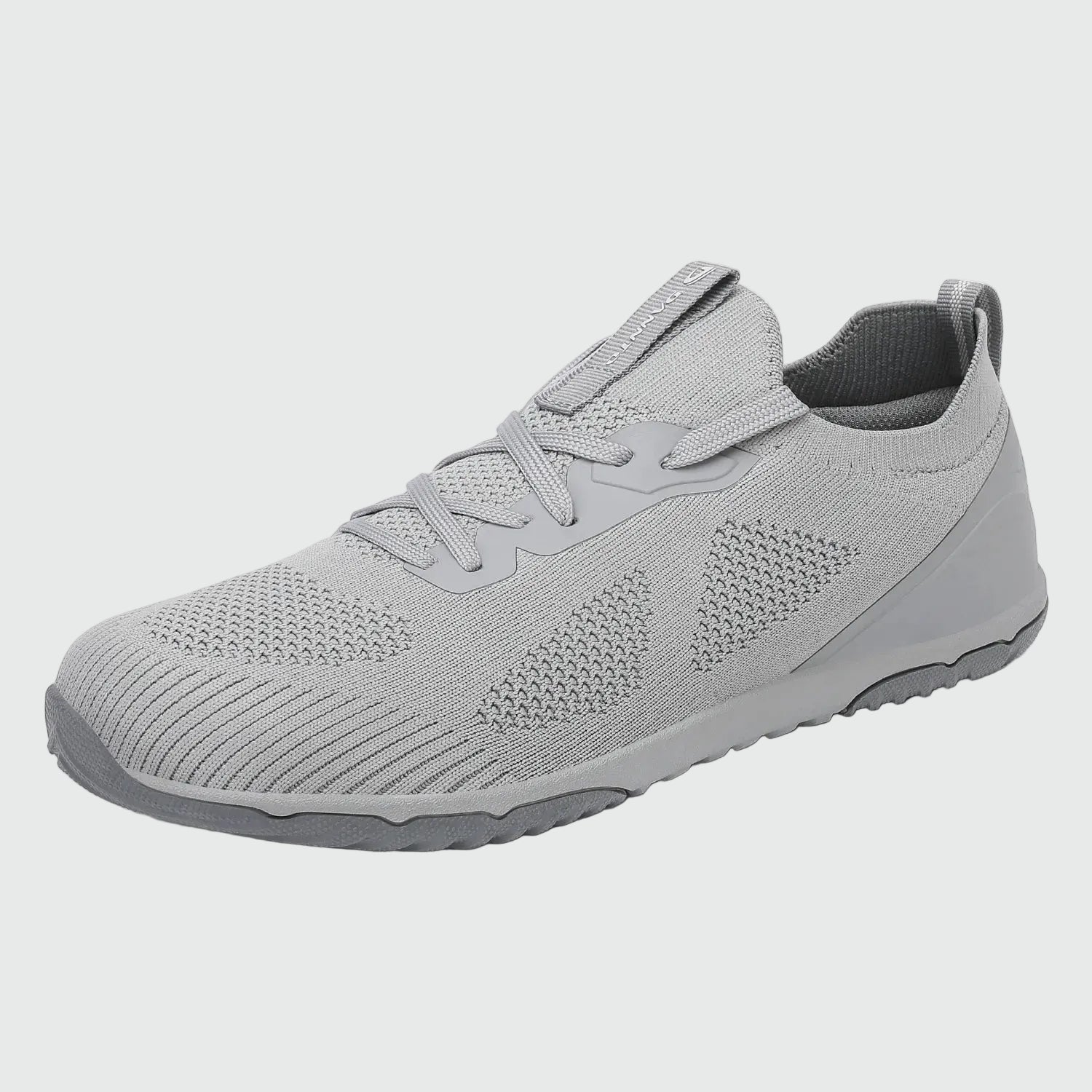 Dannto gray zero drop barefoot sneakers shown from a three quarter view