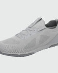 Dannto gray zero drop barefoot sneakers shown from a three quarter view