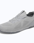 Dannto mid gray zero drop barefoot sneakers shown from a three quarter view