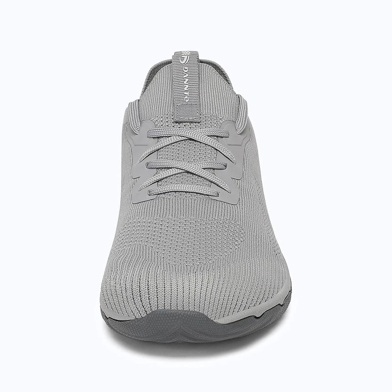 Dannto mid gray zero drop barefoot sneakers shown from the front