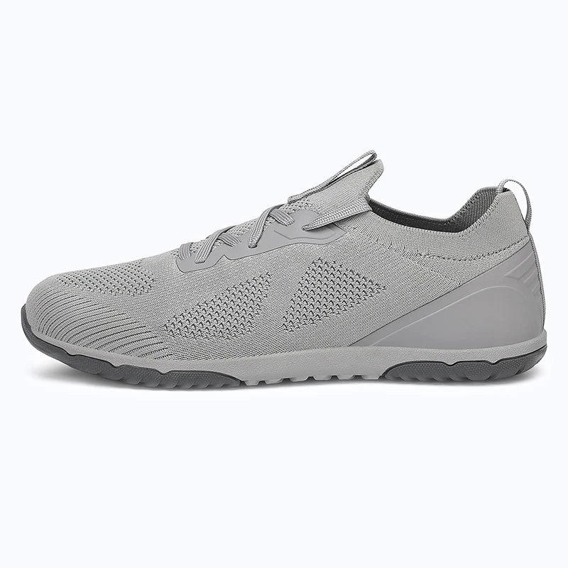 Dannto mid gray zero drop barefoot sneakers shown from the side