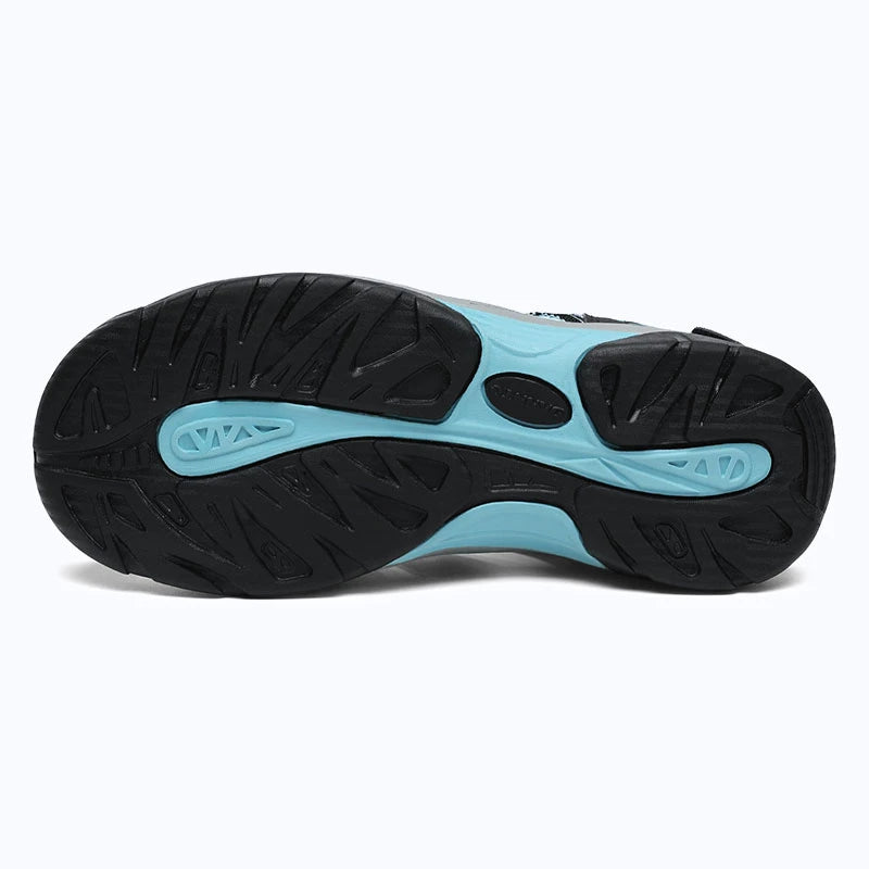 Dannto women's trailport H2 sandal black blue shown from the bottom