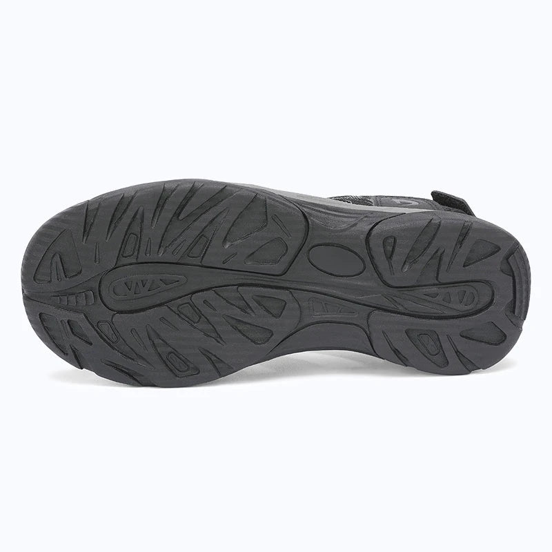 Dannto women's trailport H2 sandal black gray shown from the bottom