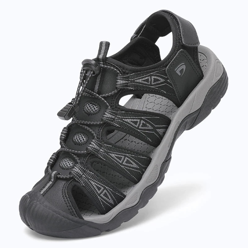 Dannto women's trailport H2 sandal black gray shown from a three quarter view