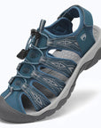 Dannto women's trailport H2 sandal navy blue shown from a three quarter view