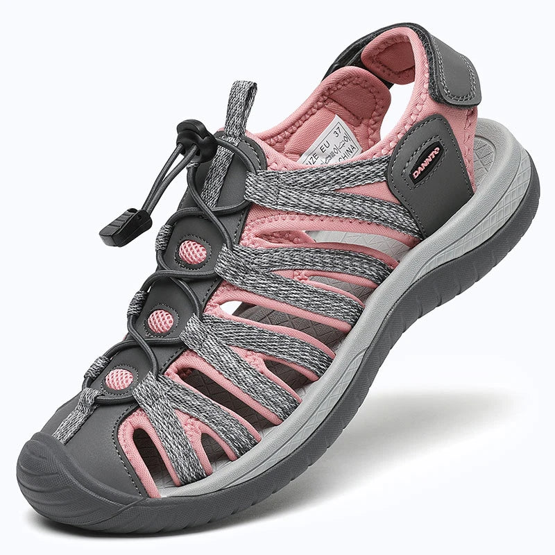Dannto women's closed toe hiking sandals S2 gray pink shown from a three quarter view