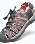 Dannto women's closed toe hiking sandals S2 gray pink shown from a three quarter view