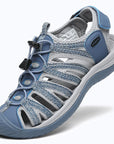 Dannto women's closed toe hiking sandals S2 blue shown from a three quarter view