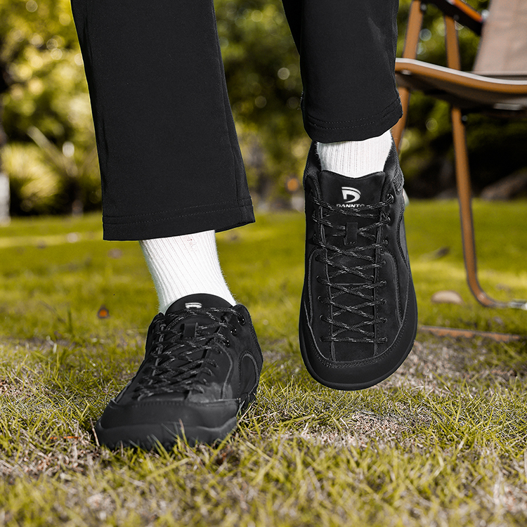 Dannto Veld I - Men's and Women's Wide Toe Box Barefoot Shoes black shown being worn while walking outdoors