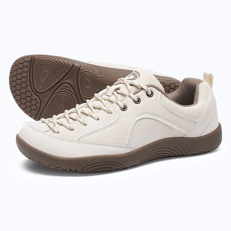 Dannto Veld I - 3E wide toe box barefoot shoes beige shown from a three-quarter view with the outsole visible