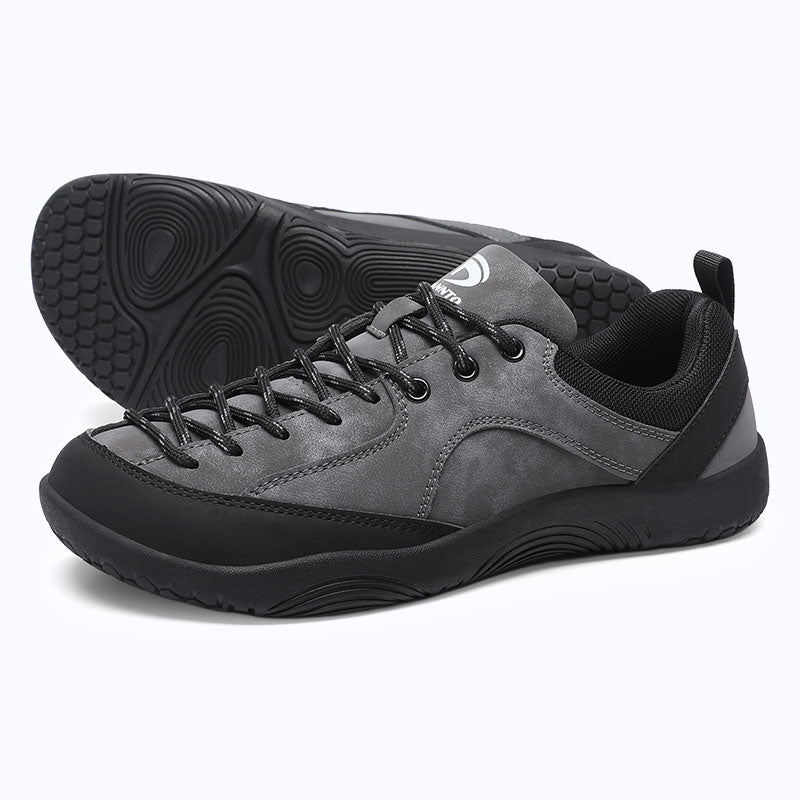 Dannto Veld I - 3E wide toe box barefoot shoes gray shown from a three-quarter view with the outsole visible