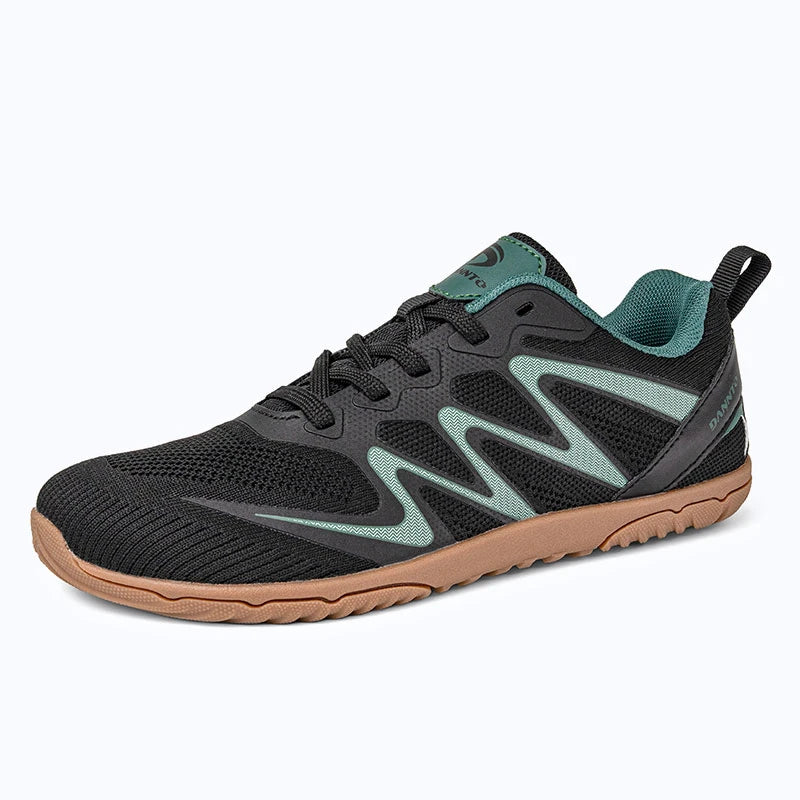 Gliss II - black wide toe box barefoot shoes for women shown from a three quarter view