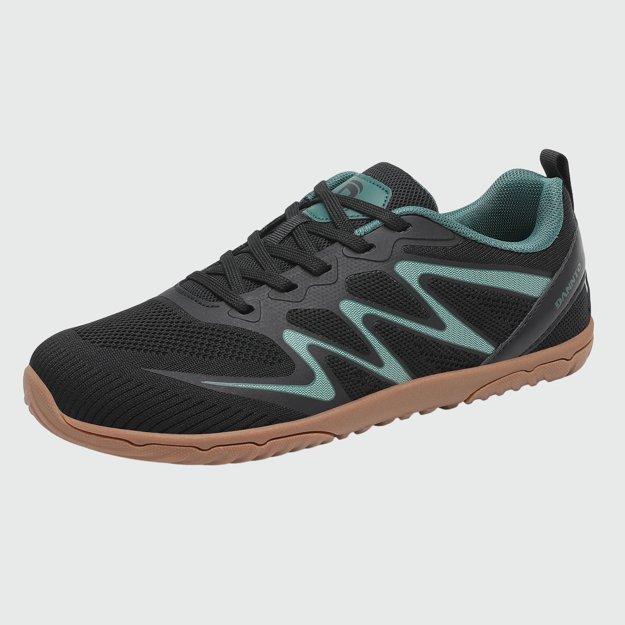Gliss II - black wide toe box barefoot shoes for women shown from a three quarter view