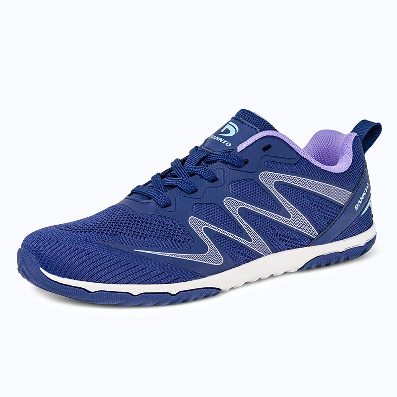 Gliss II - blue wide toe box barefoot shoes for women shown from a three quarter view