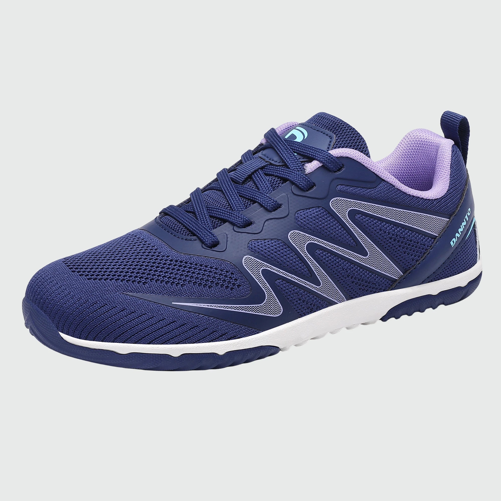 Gliss II - blue wide toe box barefoot shoes for women shown from a three quarter view