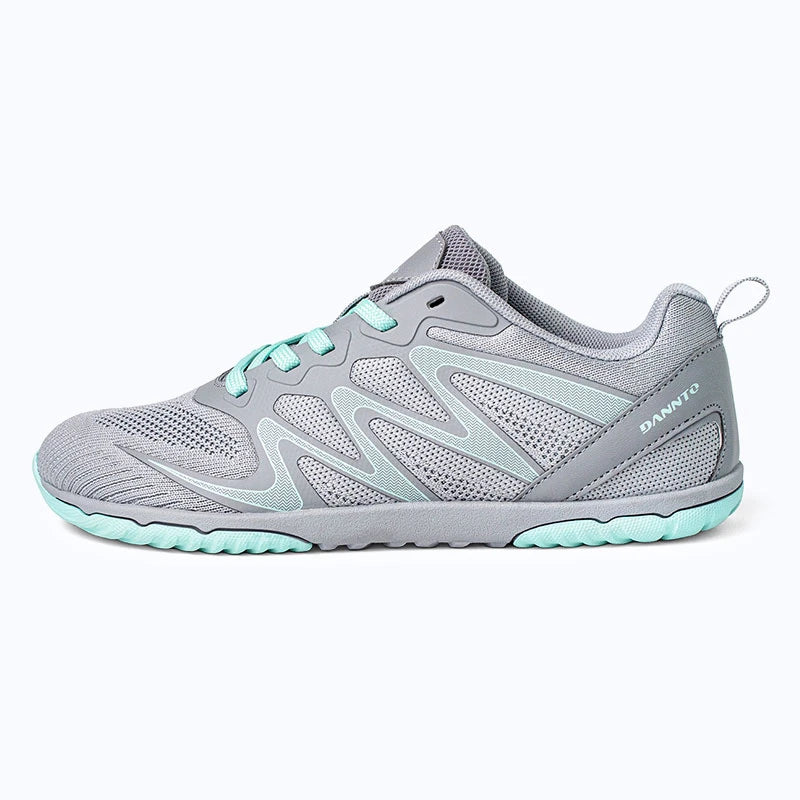 Gliss II - gray wide toe box barefoot shoes for women shown from the side