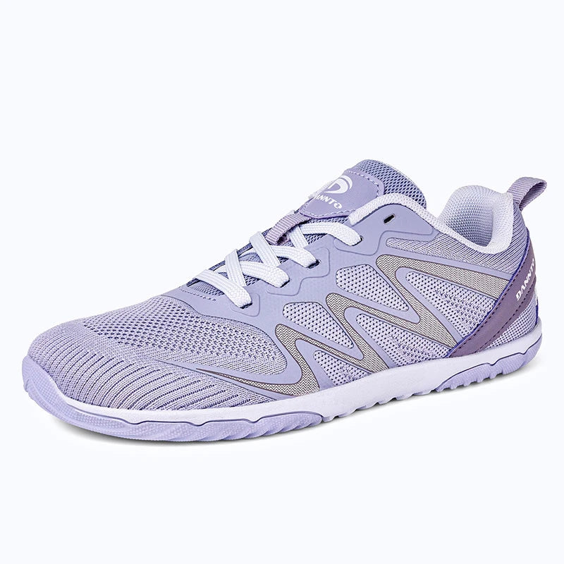 Gliss II - purple wide toe box barefoot shoes for women shown from a three quarter view