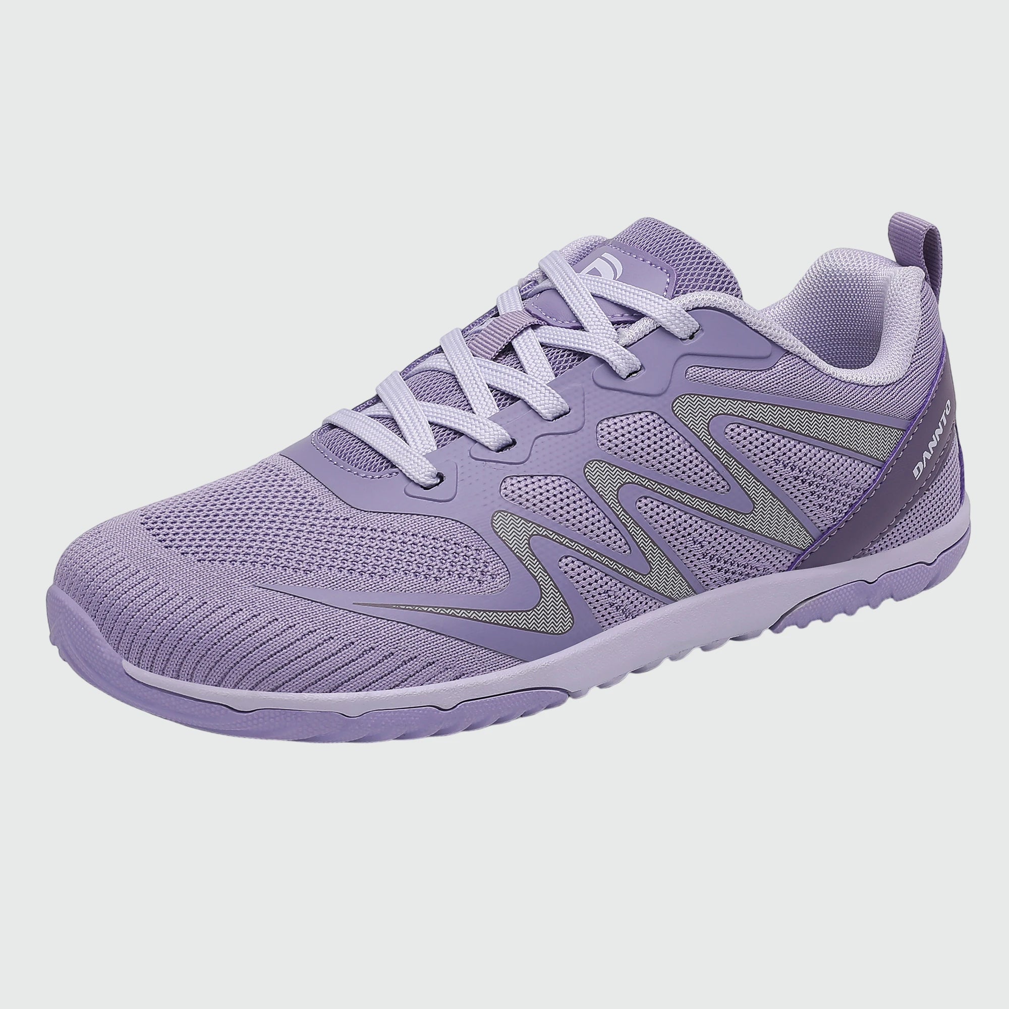 Gliss II - purple wide toe box barefoot shoes for women shown from a three quarter view