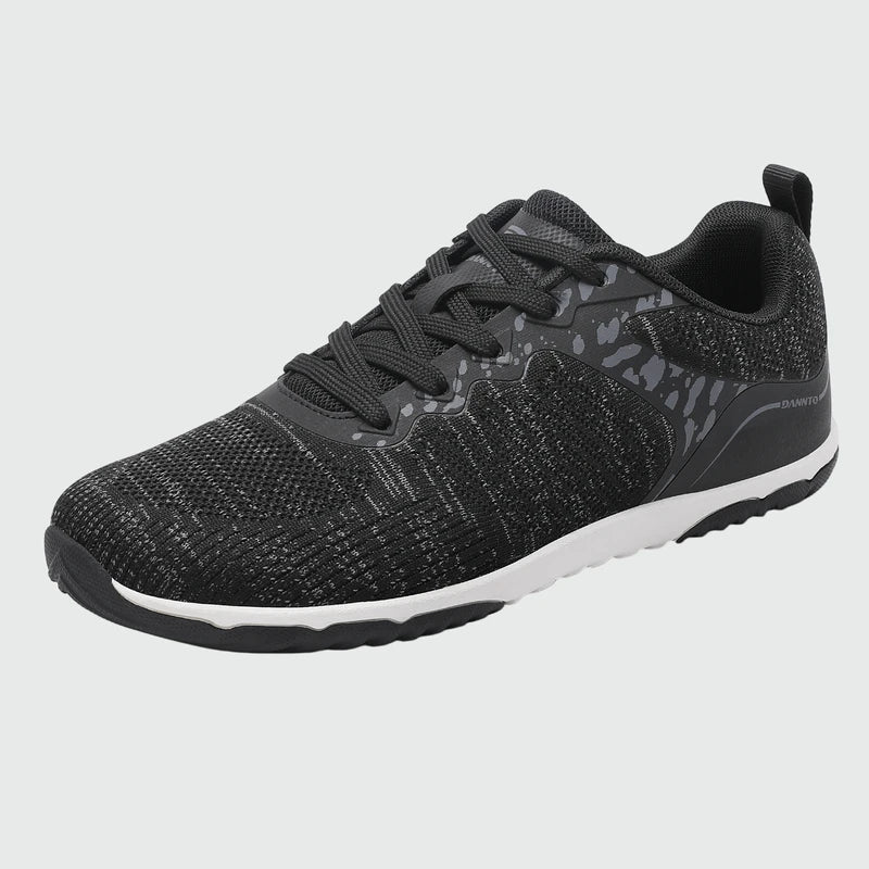 Gliss II Pro - black wide toe box barefoot shoes for women shown from a three quarter view
