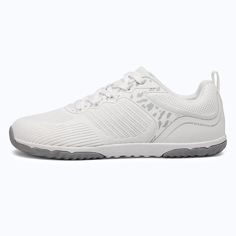 Gliss II Pro - white wide toe box barefoot shoes for women shown from the side