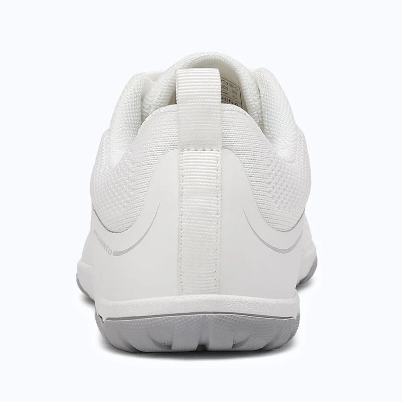 Gliss II Pro - white wide toe box barefoot shoes for women shown from the back