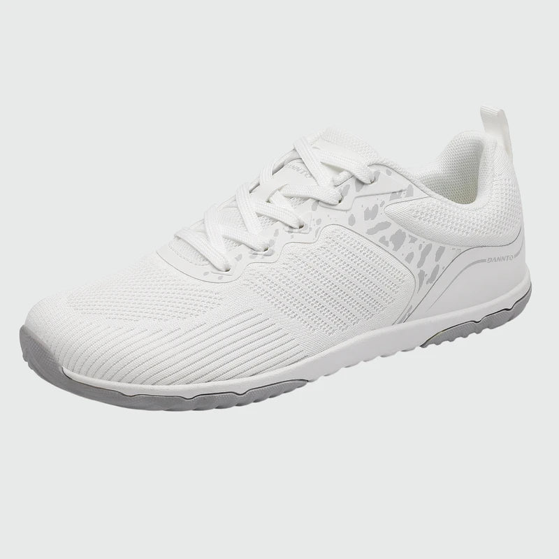 Gliss II Pro - white wide toe box barefoot shoes for women shown from a three quarter view