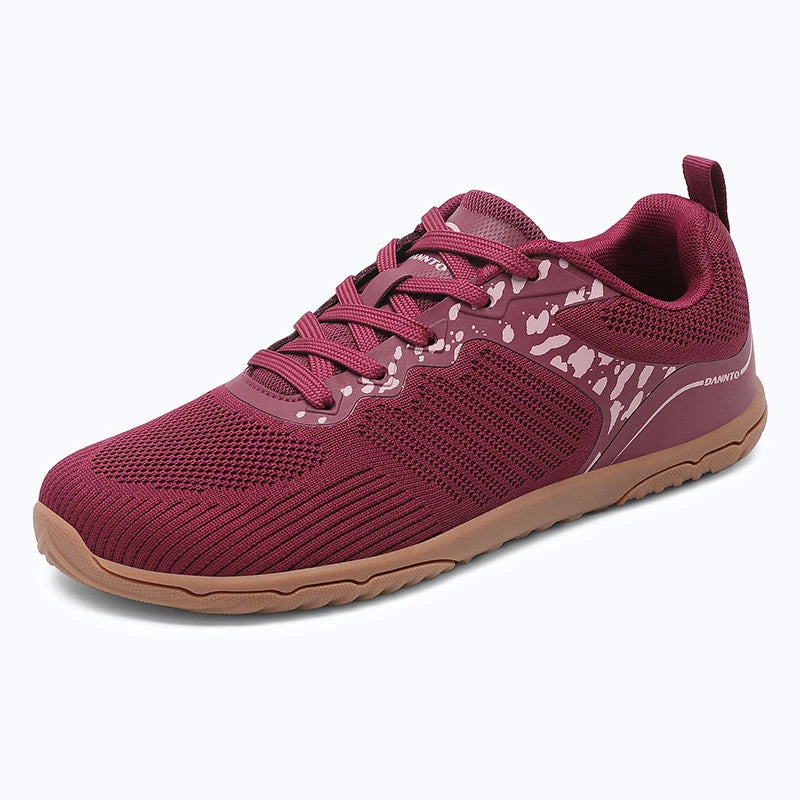 Gliss II Pro - wine red wide toe box barefoot shoes for women shown from a three quarter view
