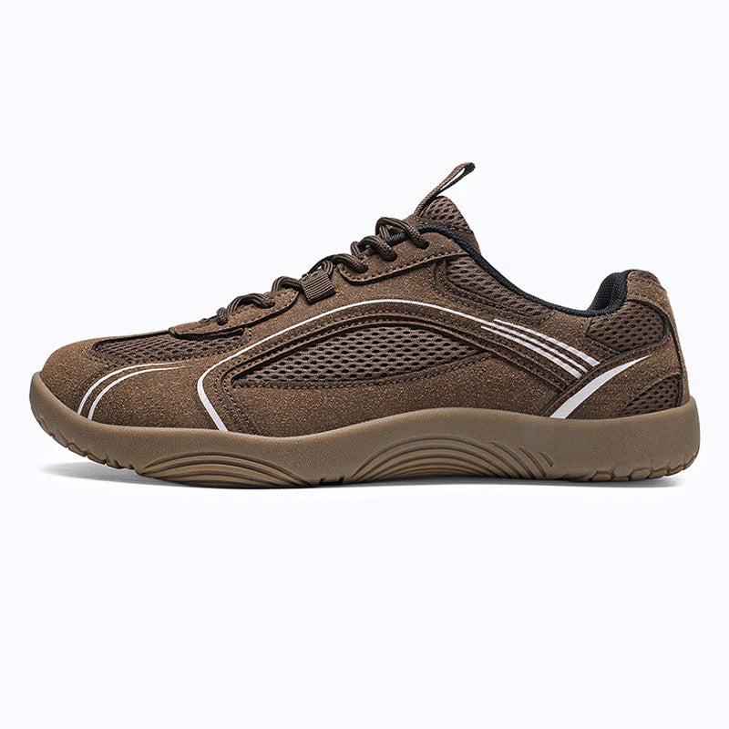 Dannto Aero N1 - 3E Wide Mesh Barefoot Shoes brown shown being put on while sitting outdoors