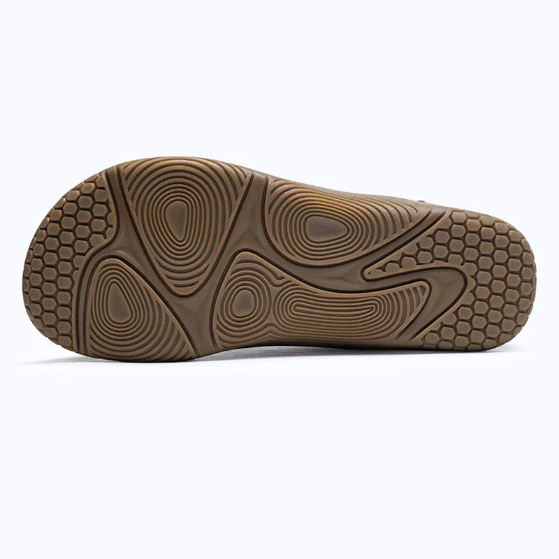 Dannto Aero N1 - 3E Wide Mesh Barefoot Shoes brown shown from a bottom view, highlighting the rubber outsole